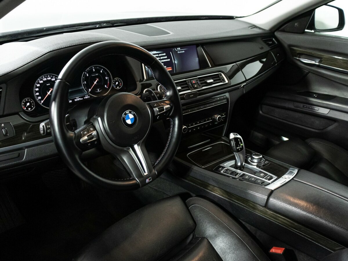 BMW 7 серии 740d xDrive V (F01/F02/F04) Рестайлинг, 2013 Фото №11